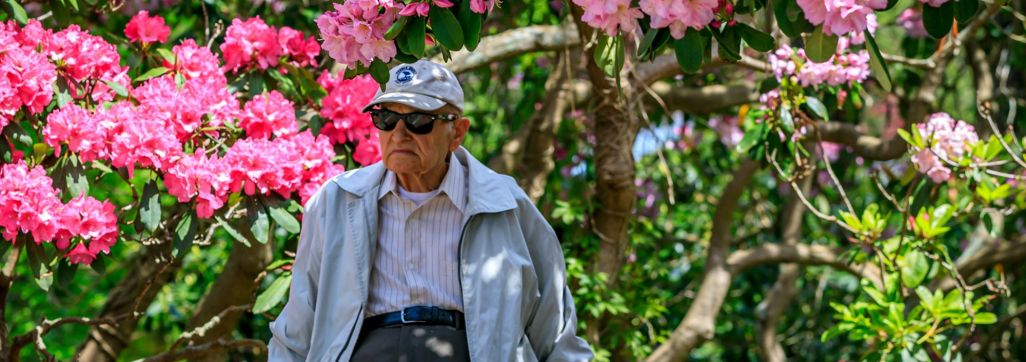 Man at Heritage with flowers